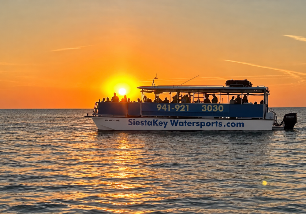 Beautiful sunset over Sarasota Bay during a Siesta Key Watersports Sunset Dolphin Cruise near Siesta Key, Florida.